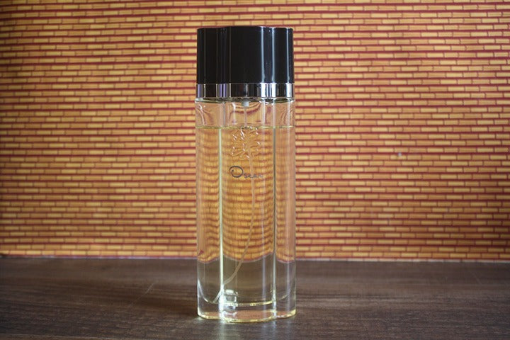 Oscar de la Renta Eau de Toilette Spray for women 3.4 oz mostly full