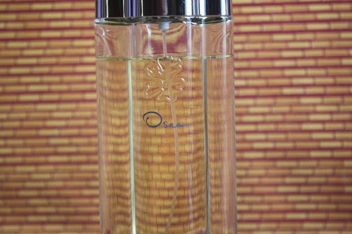 Oscar de la Renta Eau de Toilette Spray for women 3.4 oz mostly full