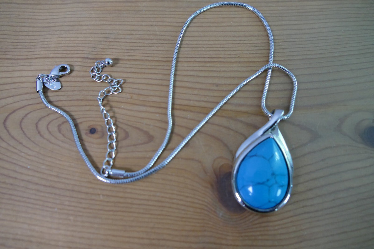 Silver Toned Lia Sophia Necklace with Teardrop Turquoise Pendant