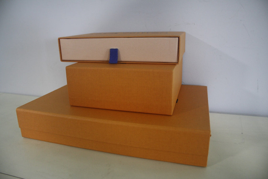 Three Empty Louis Vuitton Boxes