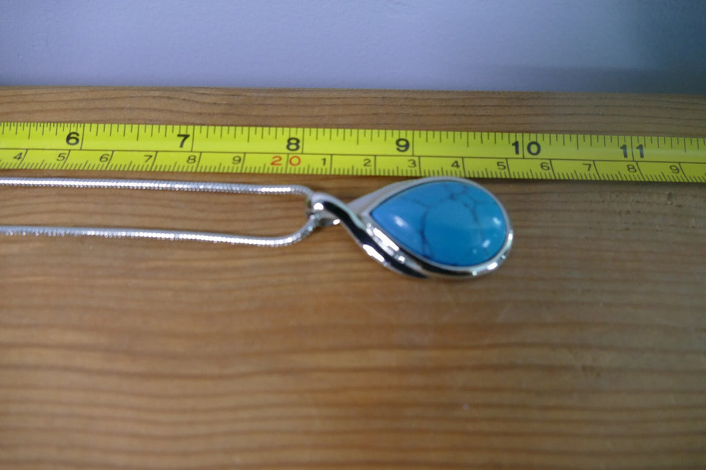 Silver Toned Lia Sophia Necklace with Teardrop Turquoise Pendant