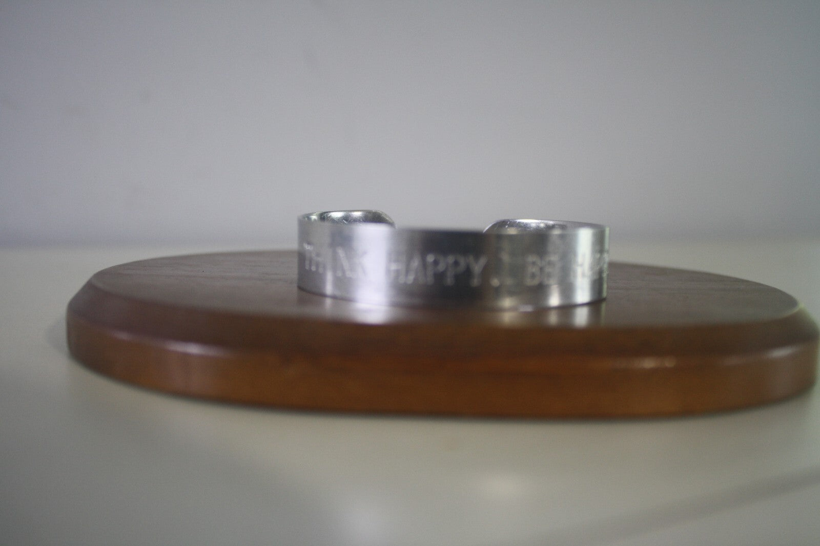 Adjustable Silver Metal Cuff Bracelet with Engraved 'THINK HAPPY. BE HAPPY.'