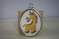 Handmade Cross Stitch Giraffe in Oval Silver Frame