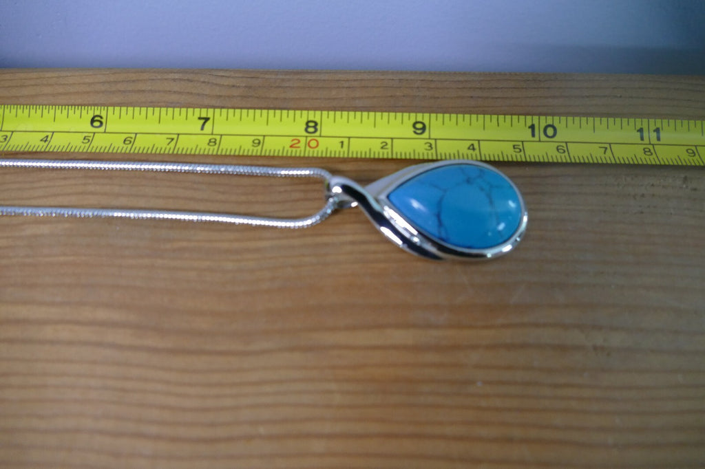 Silver Toned Lia Sophia Necklace with Teardrop Turquoise Pendant
