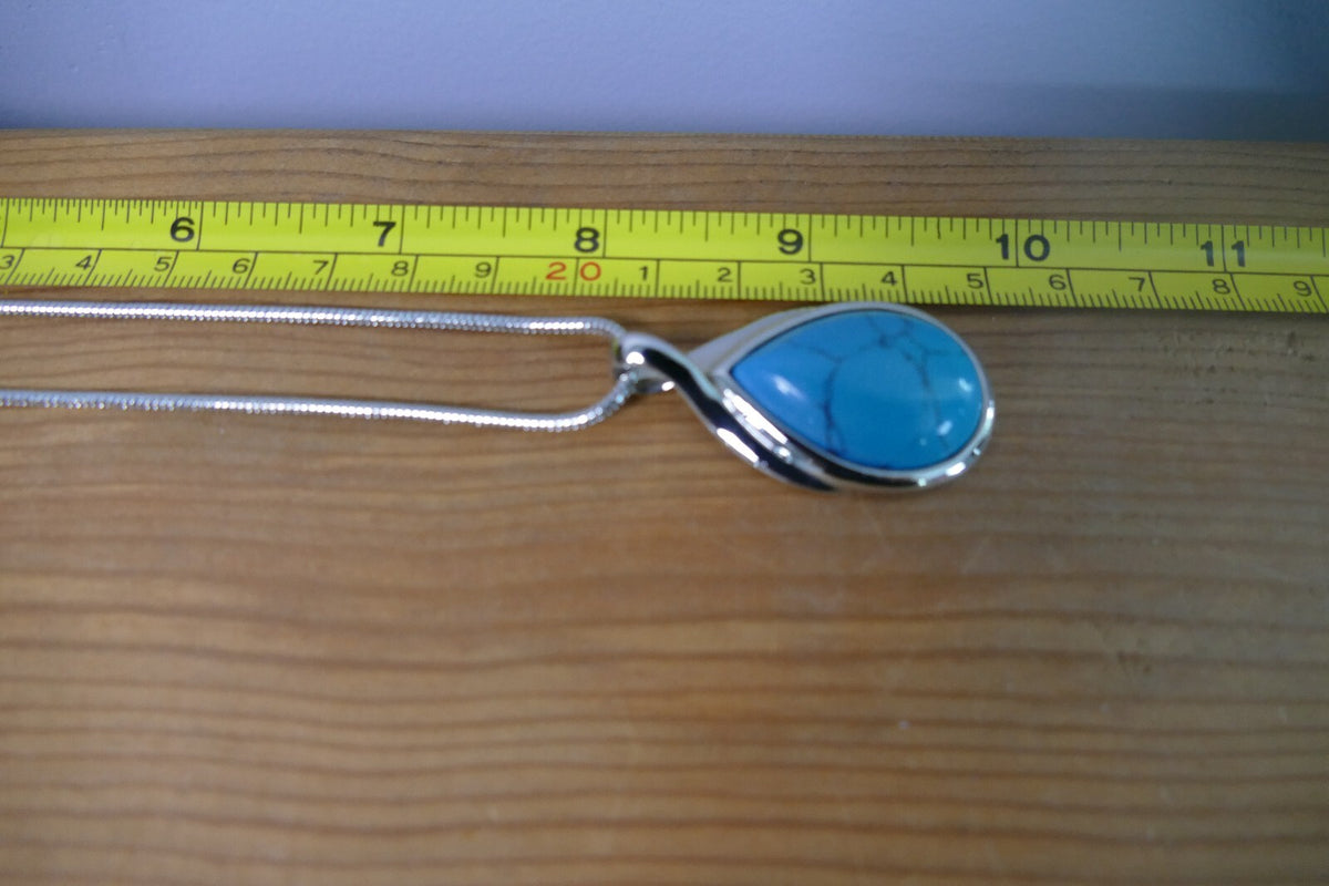 Silver Toned Lia Sophia Necklace with Teardrop Turquoise Pendant