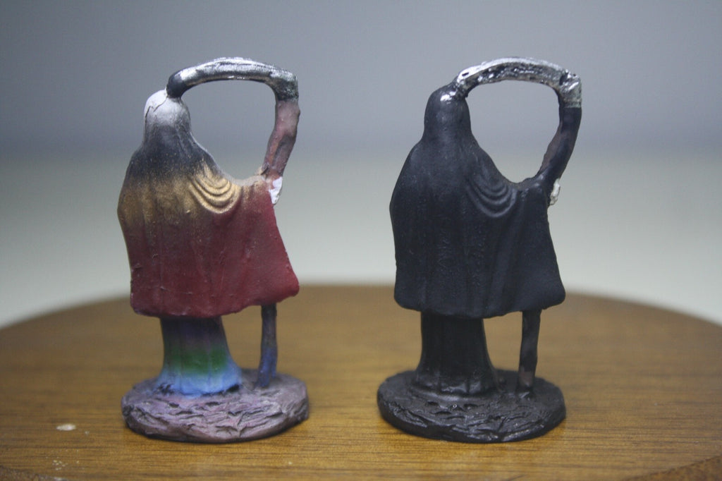Pair of Santa Muerte Figurines with Scythes
