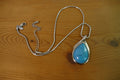 Silver Toned Lia Sophia Necklace with Teardrop Turquoise Pendant