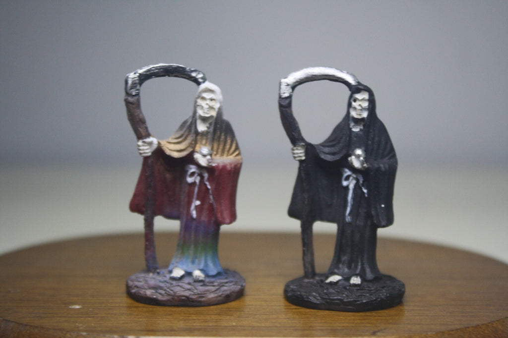 Pair of Santa Muerte Figurines with Scythes