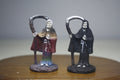 Pair of Santa Muerte Figurines with Scythes