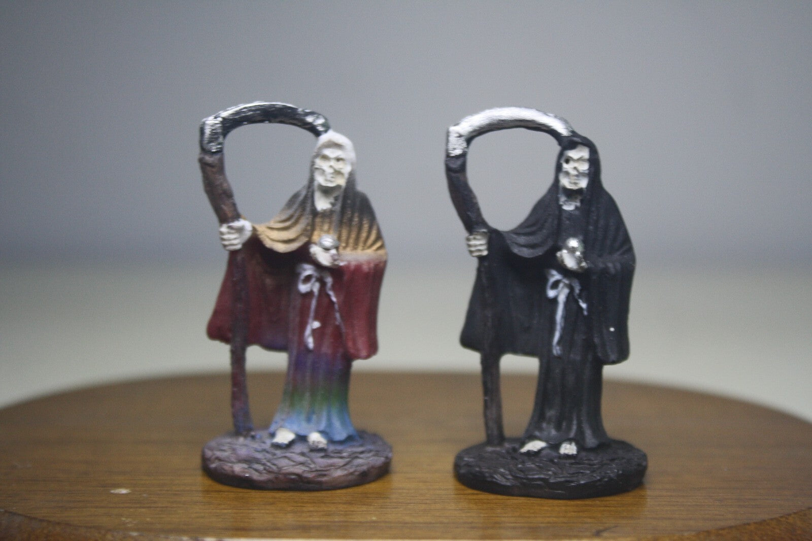 Pair of Santa Muerte Figurines with Scythes