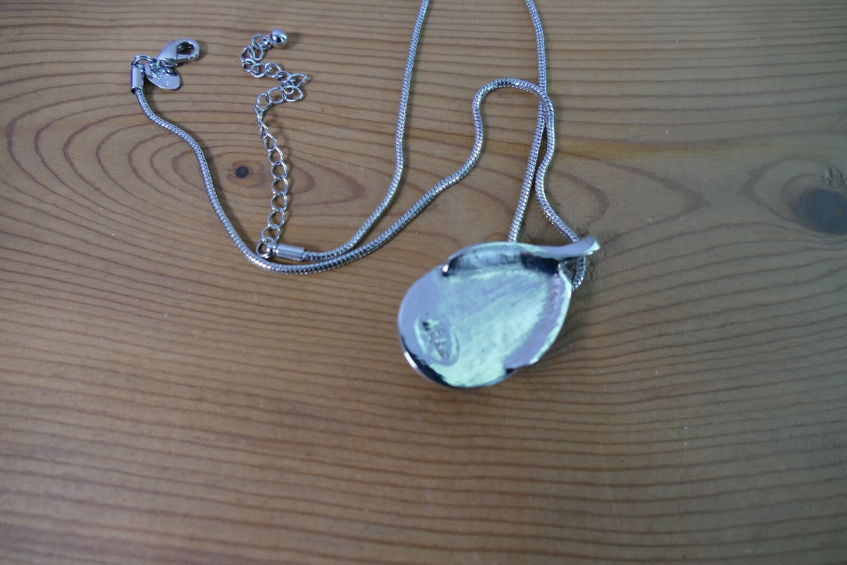 Silver Toned Lia Sophia Necklace with Teardrop Turquoise Pendant