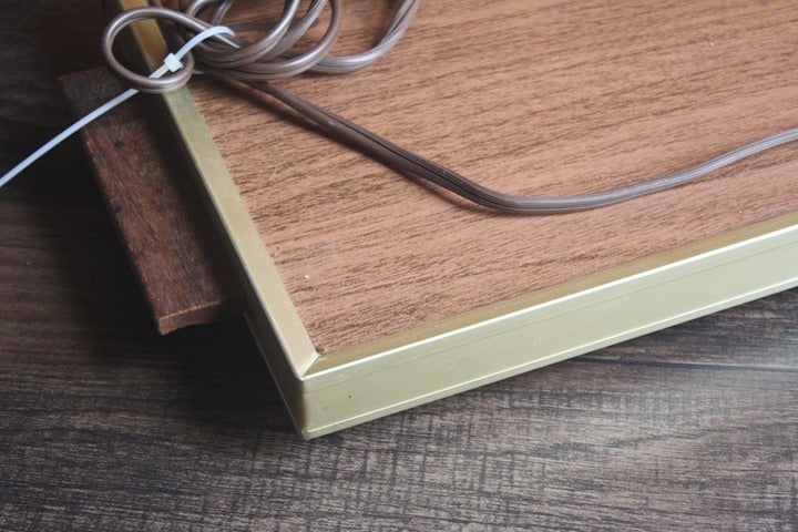 Vintage Cornwall Electric Tray with a faux walnut wood grain surface